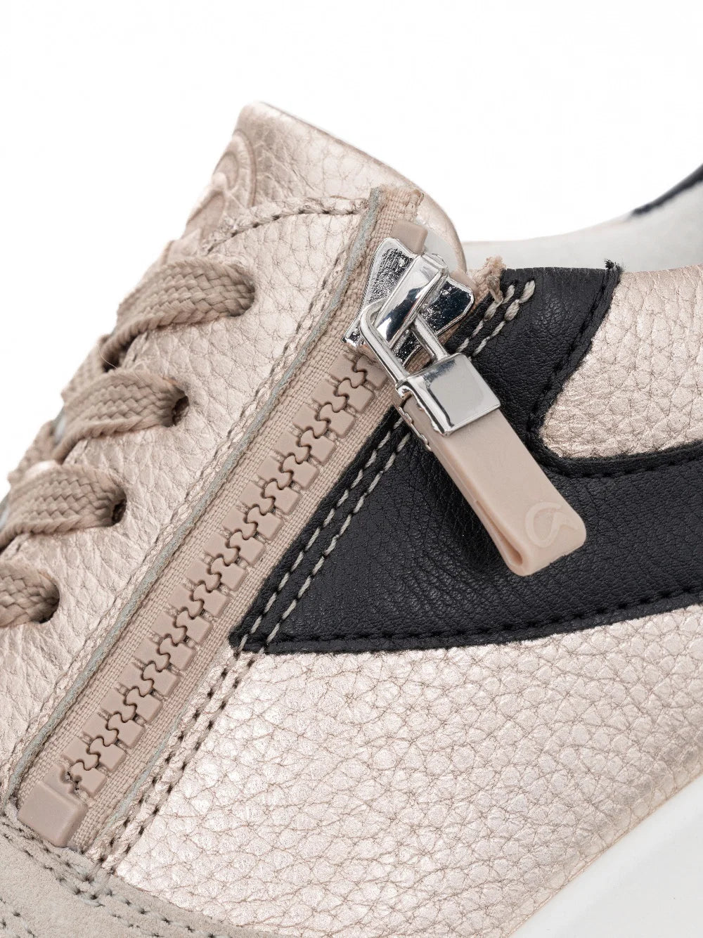 Close-up of ARA Shoes Nagano Women's Beige and black Sneakers with a zipper detail on a white background