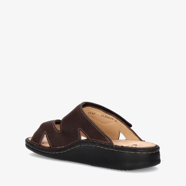 Back sided view of Brown Finn Comfort Danzig Soft Footbed leather sandal with adjustable velcro straps on a white background