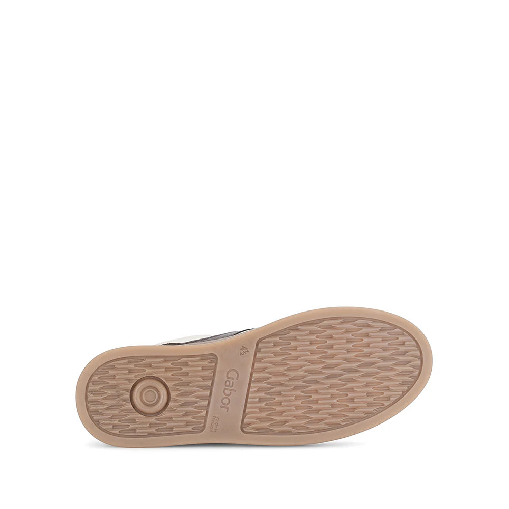 Close-up of a shoe sole with brand logo Gabor on a white background