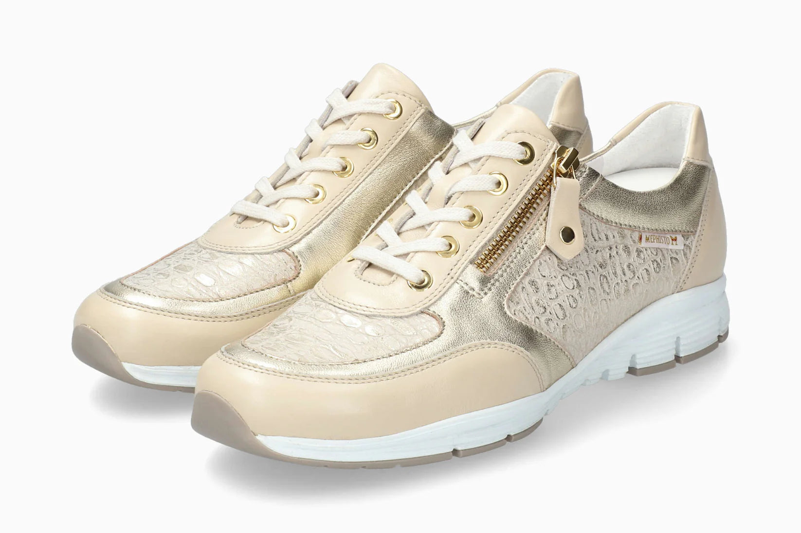 Mephisto Ylona women’s lace-up sneaker in light sand and white gold angled view. Shop now at Foot Sensation.