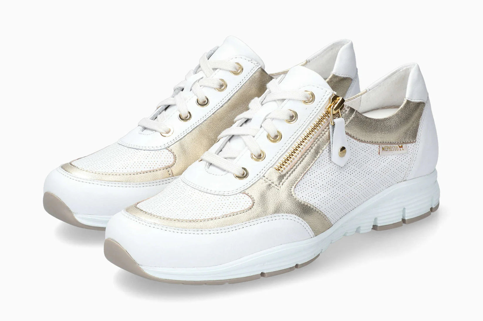 Mephisto Ylona women’s lace-up view of pair ofsneaker white gold. Shop now at Foot Sensation
