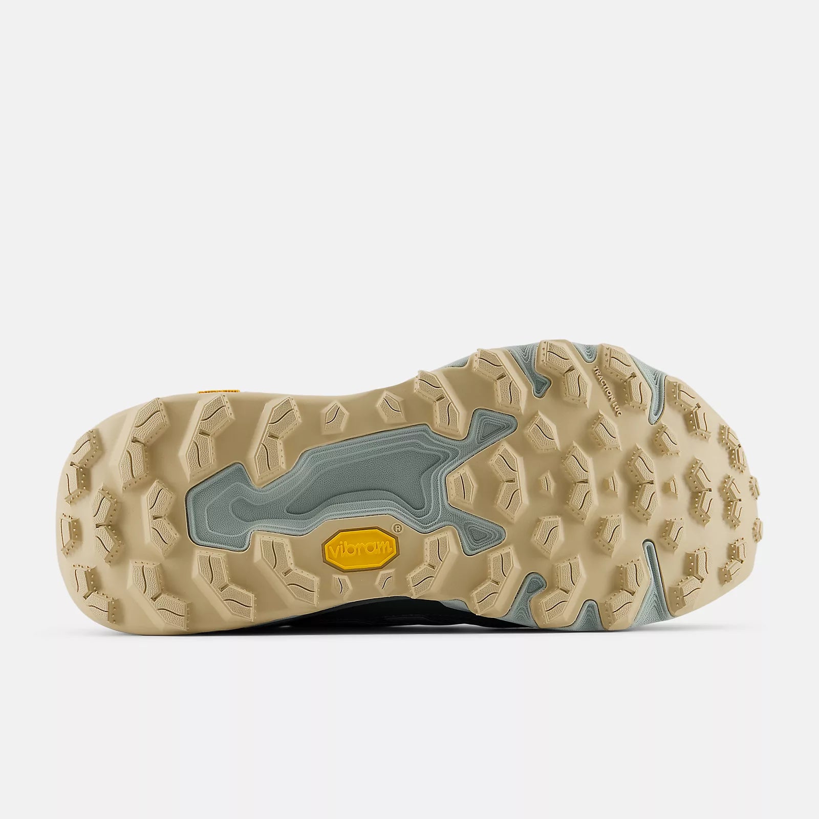 Close-up of a beige and gray shoe sole with a yellow accent on a white background NEW BALANCE WHIET6QZ Hierro Trek Trail Running Slate Grey Women shoe Foot Sensation Canada Online Store in-store Toronto Mississauga Vancouver Montreal Ottawa Quebec Calgary Edmonton Winnipeg