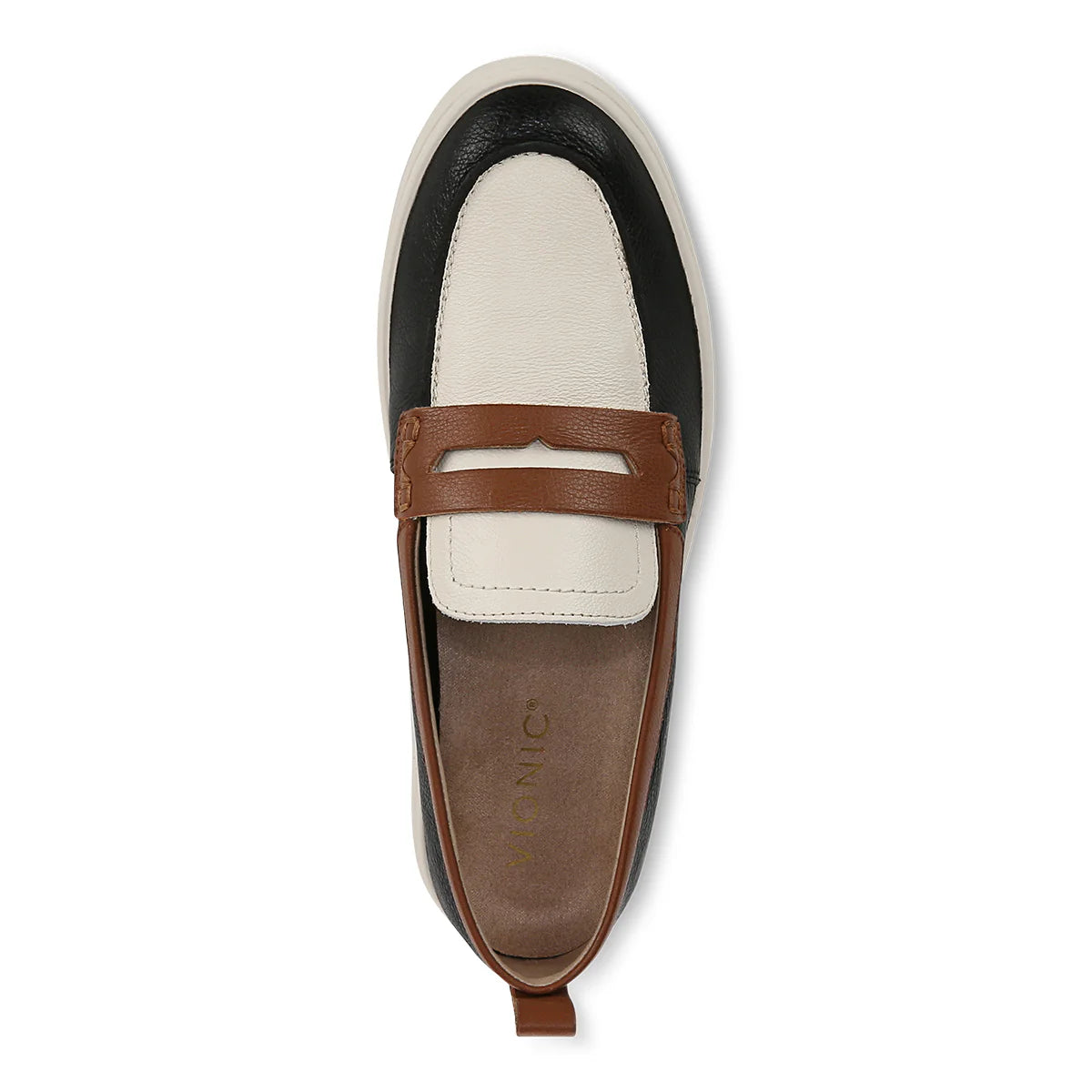 VIONIC UPTOWN Loafer shoe with brown strap and white and black accents on a white background