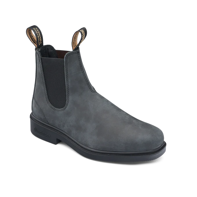 Discover the Blundstone 1308 Chisel Toe boot in Rustic Black — a refined Chelsea boot combining classic style with all-day comfort. Crafted from premium leather with a sleek chisel toe silhouette, this Blundstone boot is ideal for work, travel, and everyday wear. Featuring elastic side panels, durable TPU outsole, and shock-absorbing comfort, the Blundstone 1308 delivers timeless design with legendary durability.