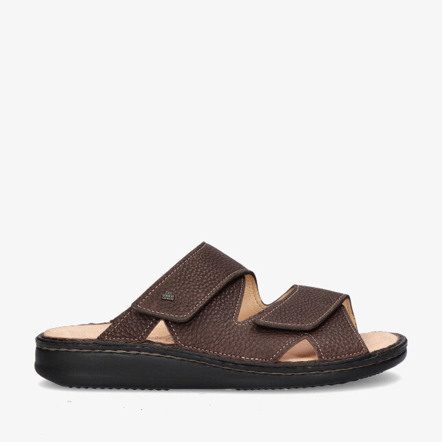 Side view of Brown Finn Comfort Danzig Soft Footbed leather sandal with adjustable on a white background.