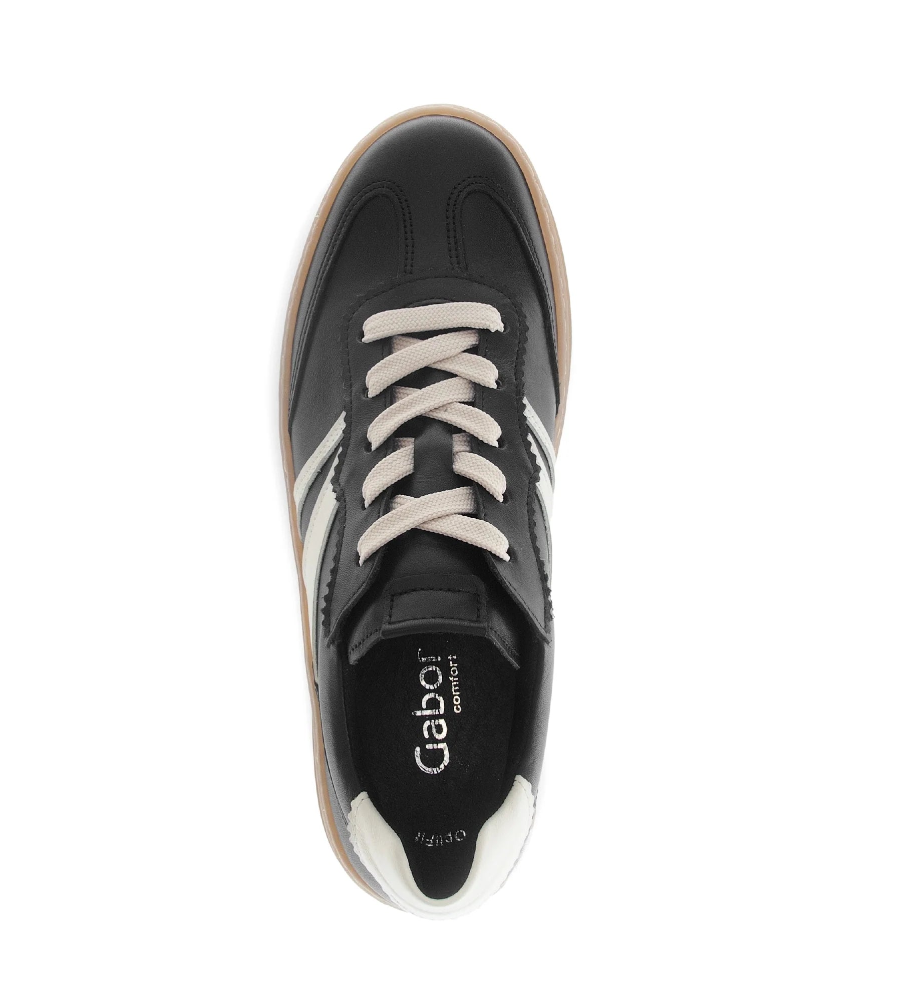 Top view of black sneaker with white laces and sole on a white background