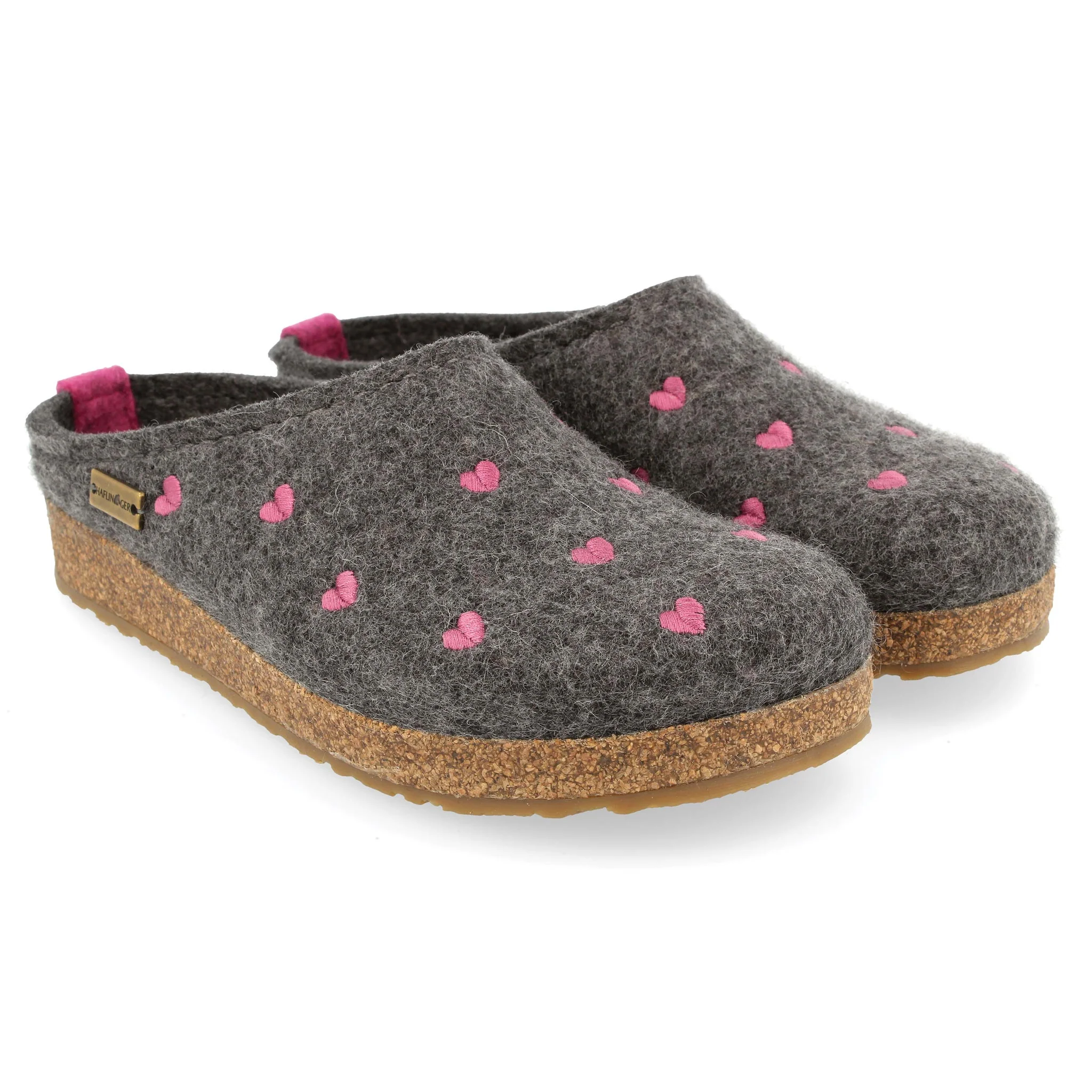 Pair of Haflinger Cuoricini clog gray slippers with pink heart patterns on a white background