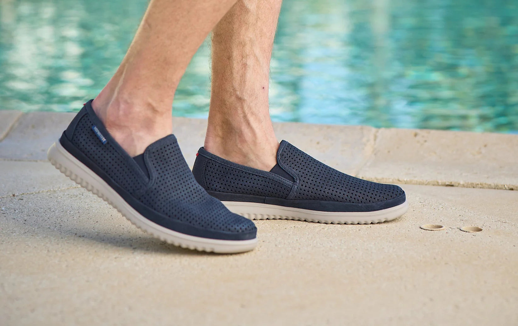 MEPHISTO Tiago navy slip-on loafers worn outdoors